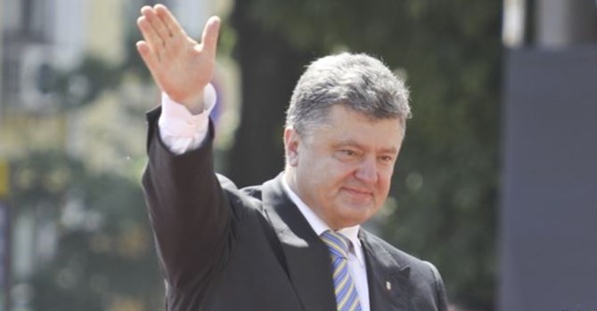 ผู้นำยูเครน รัสเซียและเยอรมนีหารือถึงแผนการฟื้นฟูสันติภาพในภาคตะวันออกยูเครน - ảnh 1